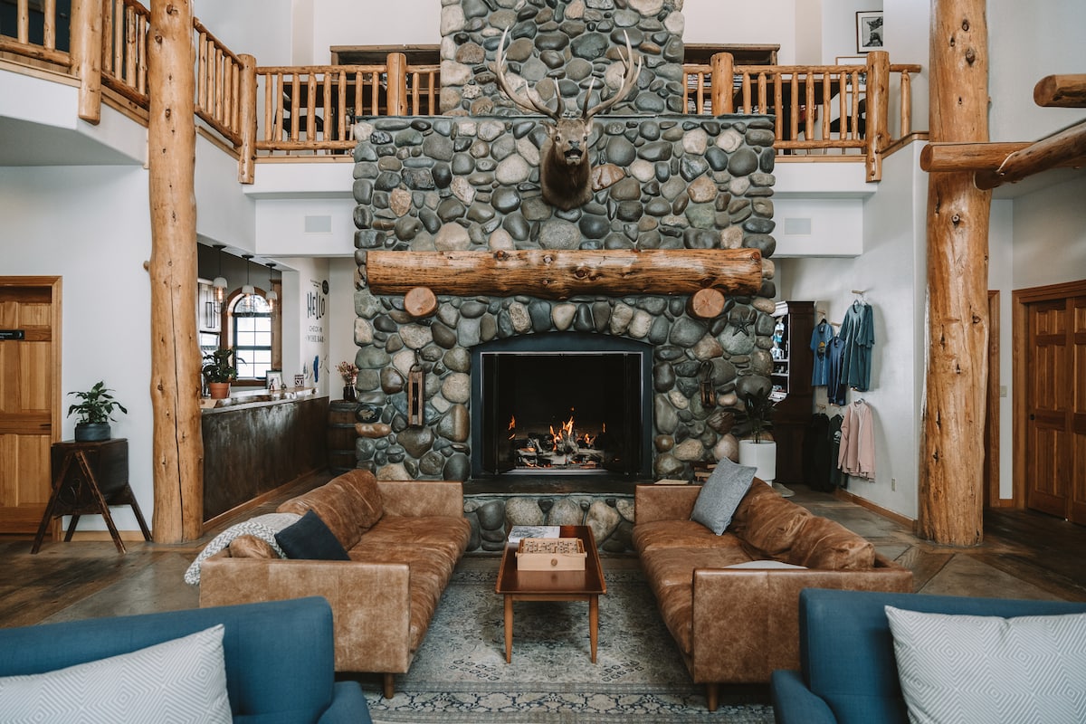 Communal fireplace sitting area inside Black Bear Lodge