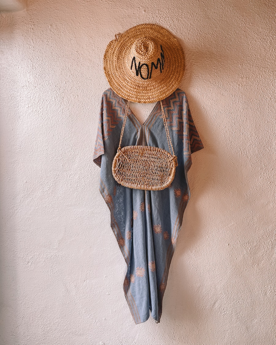 Nomad Chic store Outfit hanging in Nomad Chic store in Todos Santos | What To Pack For A Beach Vacation