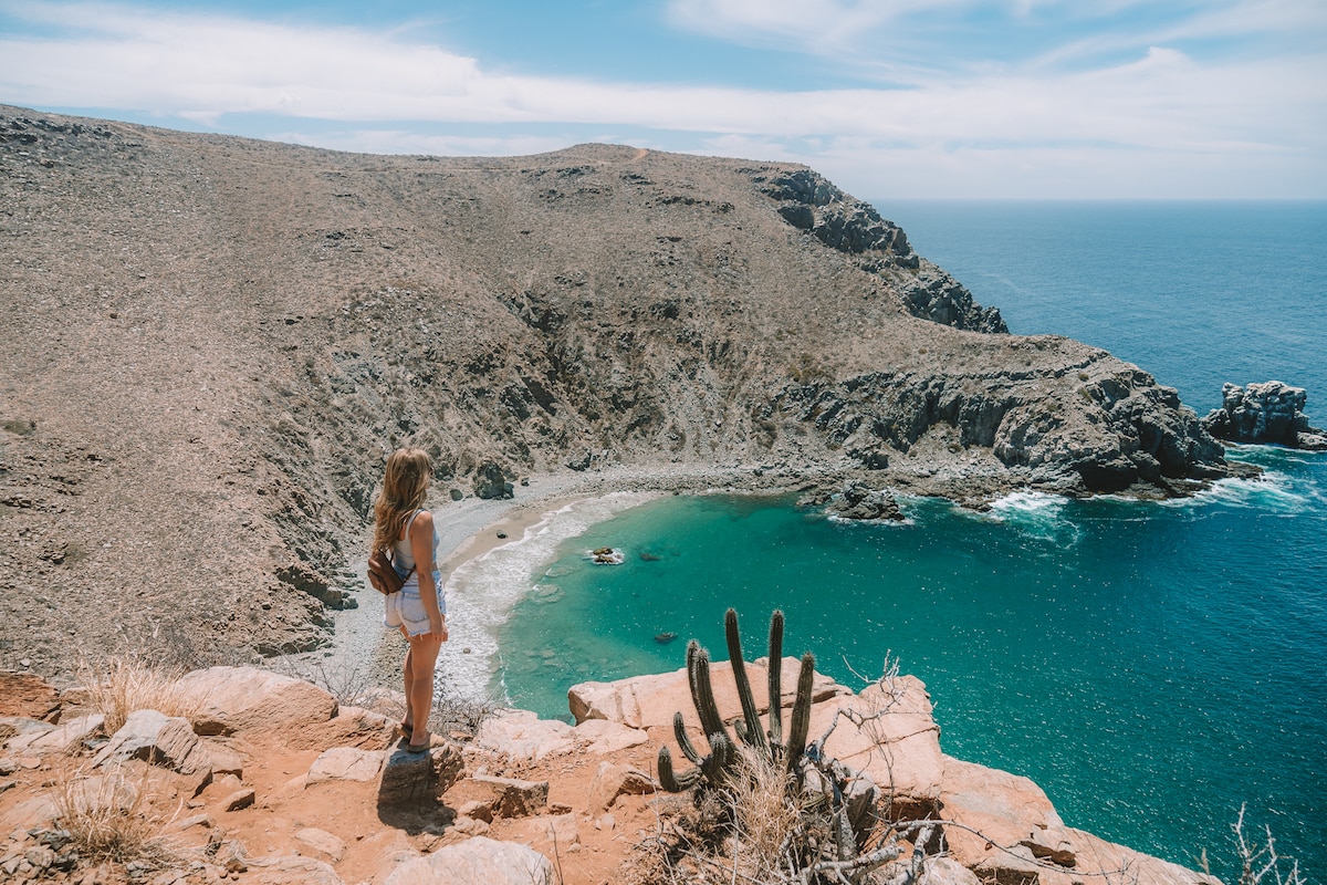 Michelle Halpern at the top of Punta Lobos hike, one of the best things to do in Todos Santos