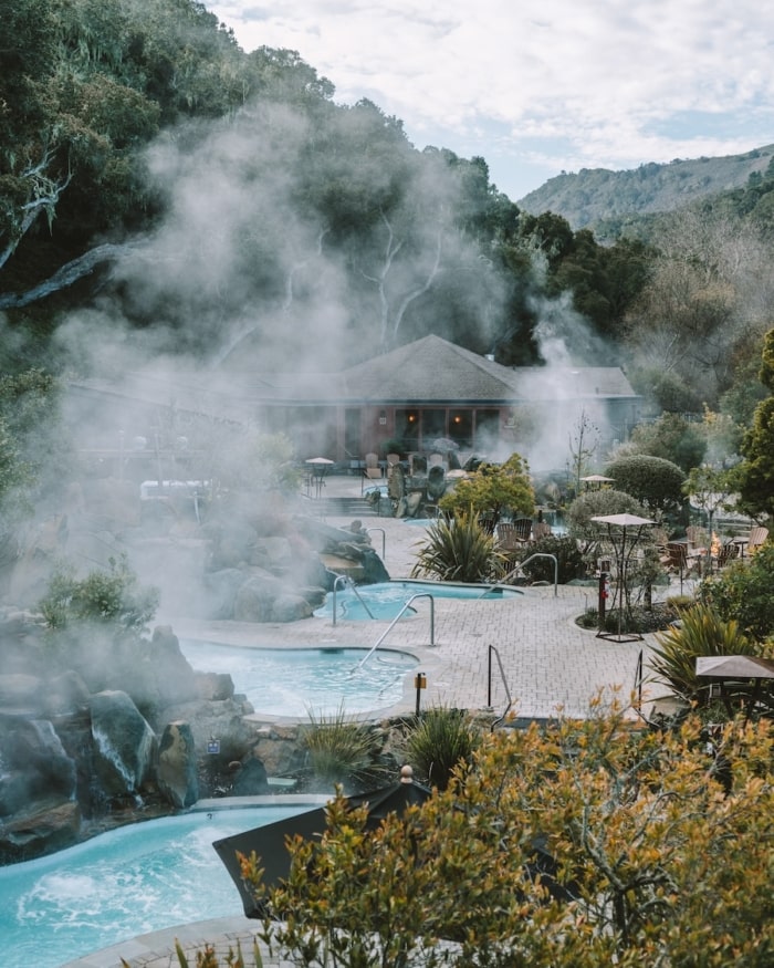 Steam coming from hot pools at Refuge Spa in Carmel