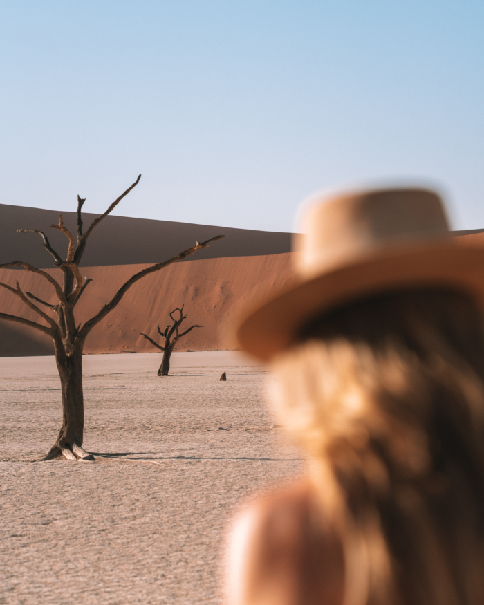 Michelle desert Michelle wearing a hat at the desert with desserts in the background.