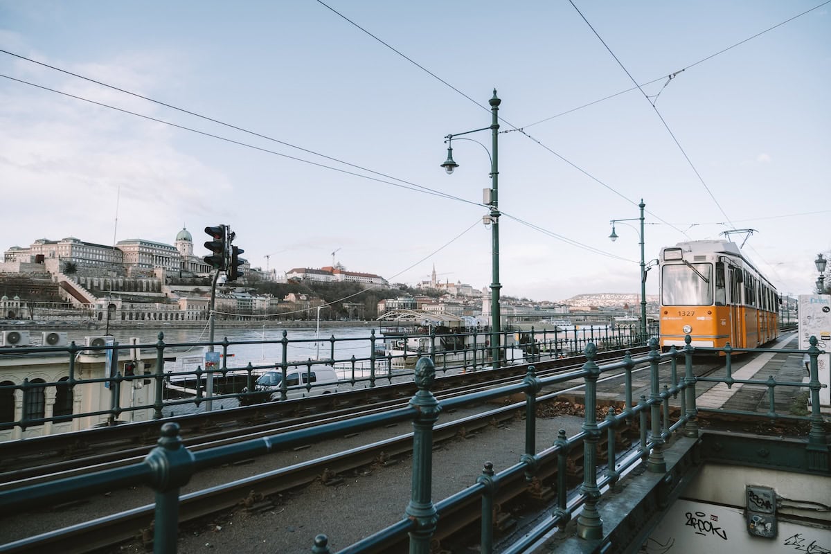 Orange train car Orange train car arriving on tracks that overlook the Danube River