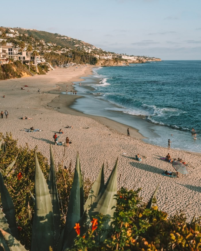 Treasure Island Beach sunset Sunny day at Treasure Island Beach with beachgoers and umbrellas down on the beach below