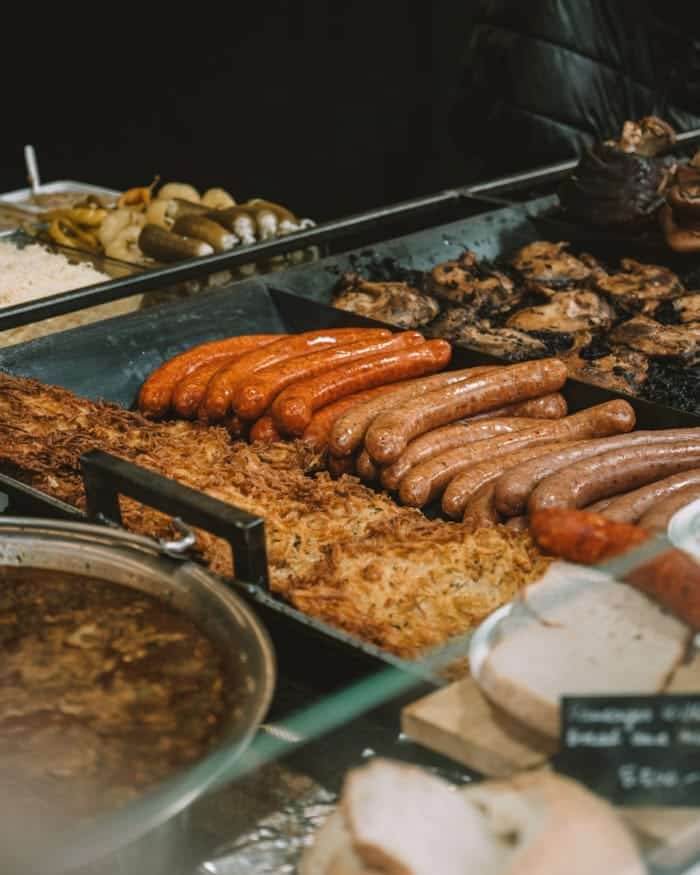 Potato pancakes and sausages Potato pancakes and sausages at a food vendor at the Budapest Christmas Markets
