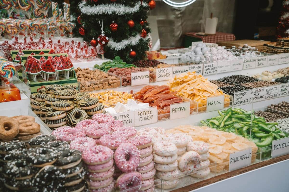 Piles of sweets Piles of sweets like donuts and candy at a Christmas Market stall in Budapest