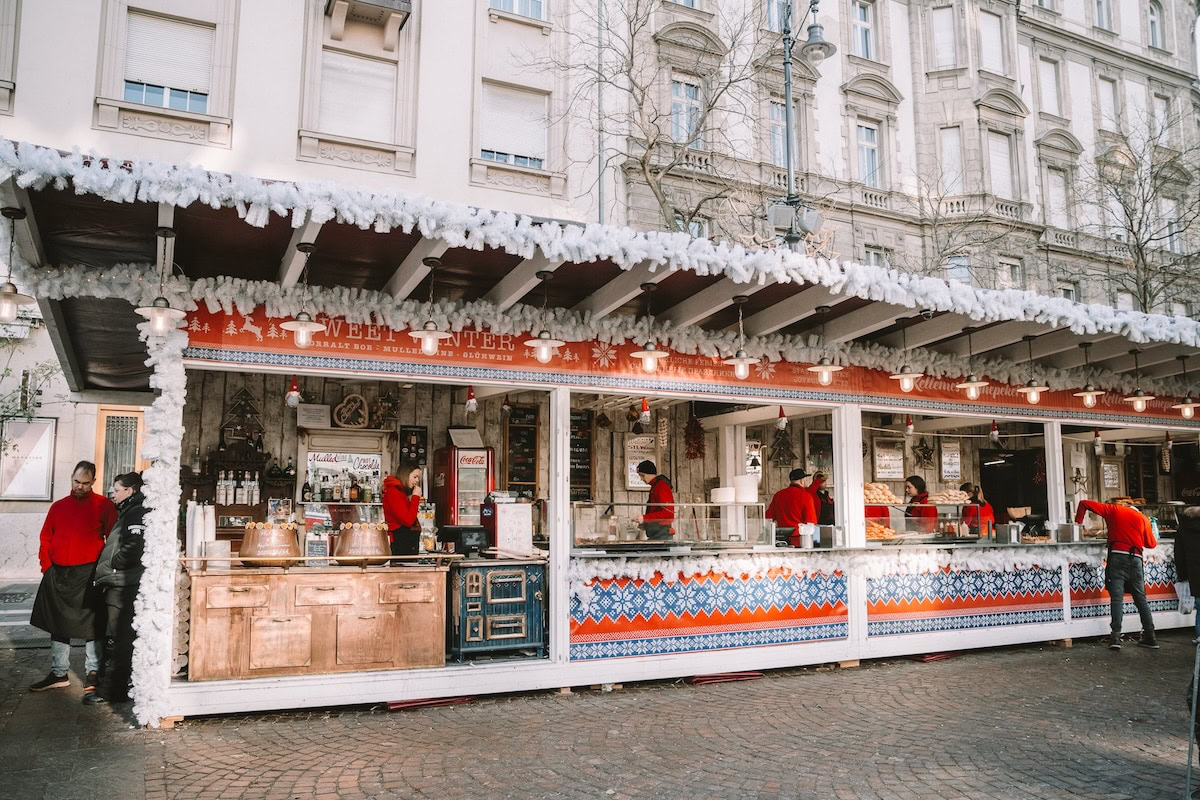 vendors at the Christmas Market Festive food vendors at the Christmas Markets decked out in white snowy looking decor