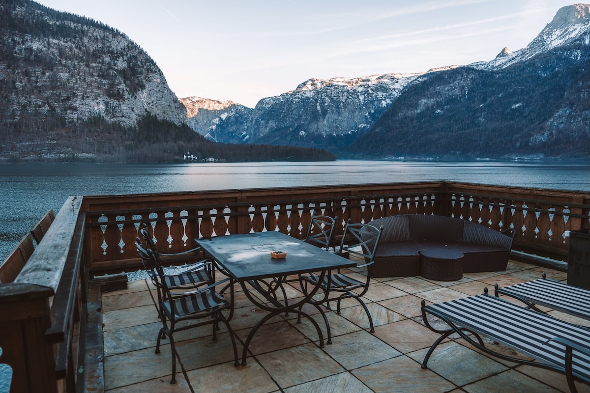 Where to Stay in Hallstatt Balcony with front row view looking out to the lake in Hallstatt, Austria