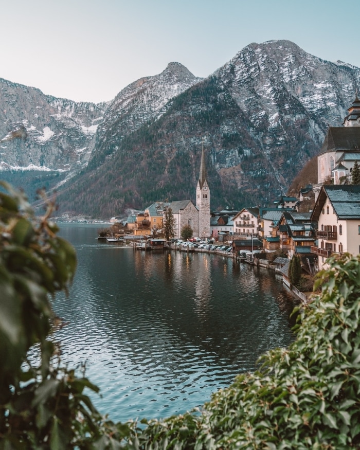 Hallstatt Lutheran Church Hallstatt's most prominent church off in the distance and framed by green foliage