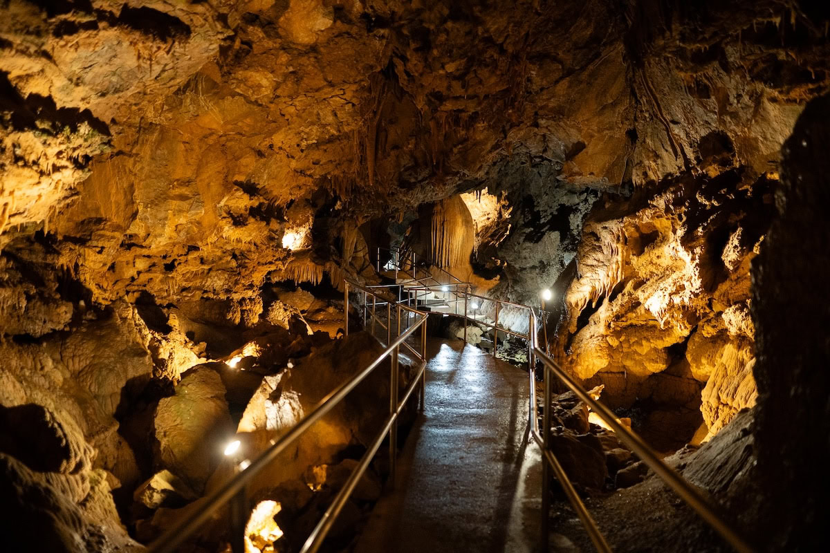Interior of Lake Shasta Caverns Interior of Lake Shasta Caverns with stalactites and stalagmites lit up by LEDs