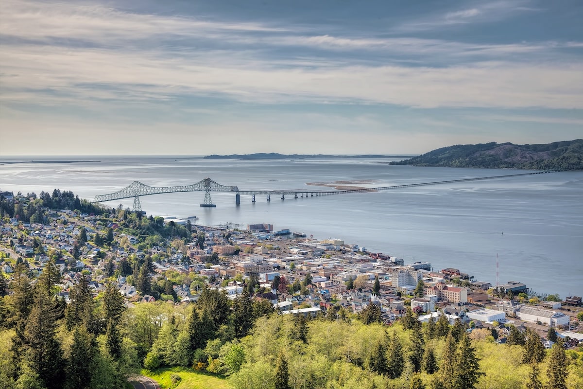 Best Oregon Coast Towns Cityscape in Astoria, Oregon where the city meets the ocean from above