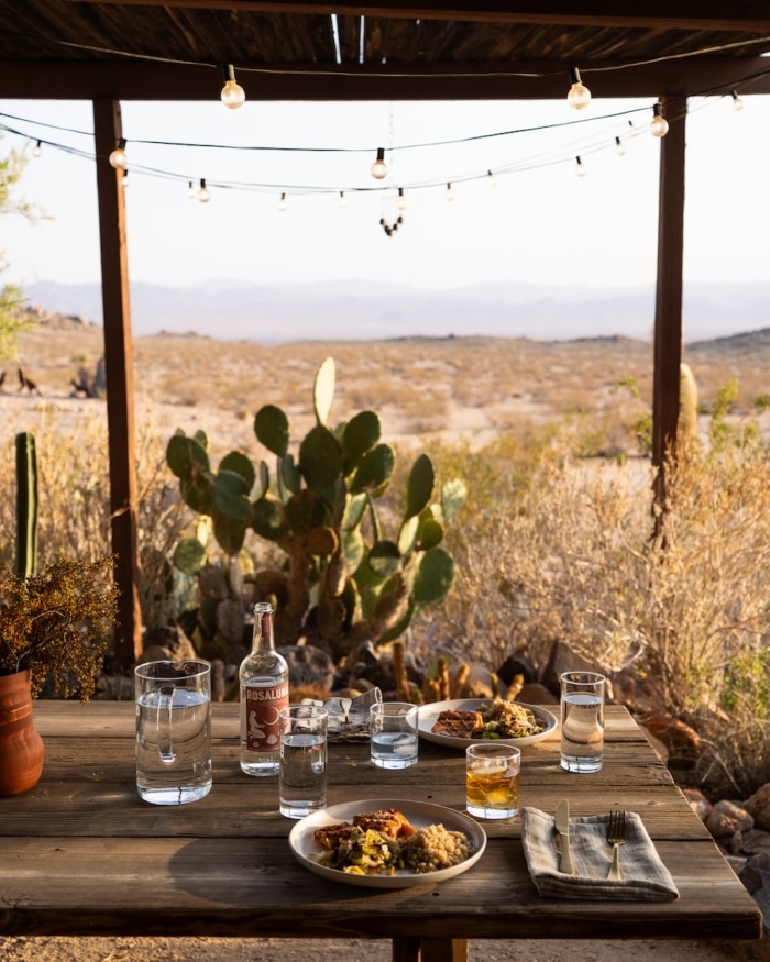 salmon dinner Outdoor wooden table set up with salmon dinner