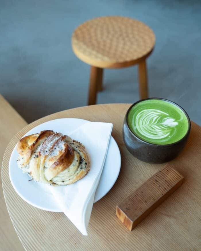 Cardamon bun and matcha latt Cardamon bun and matcha latte at Lokal ApS.