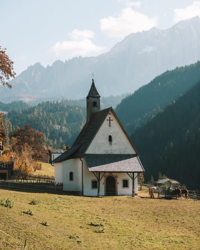 Tiny little church Tiny little church with horses in the countryside