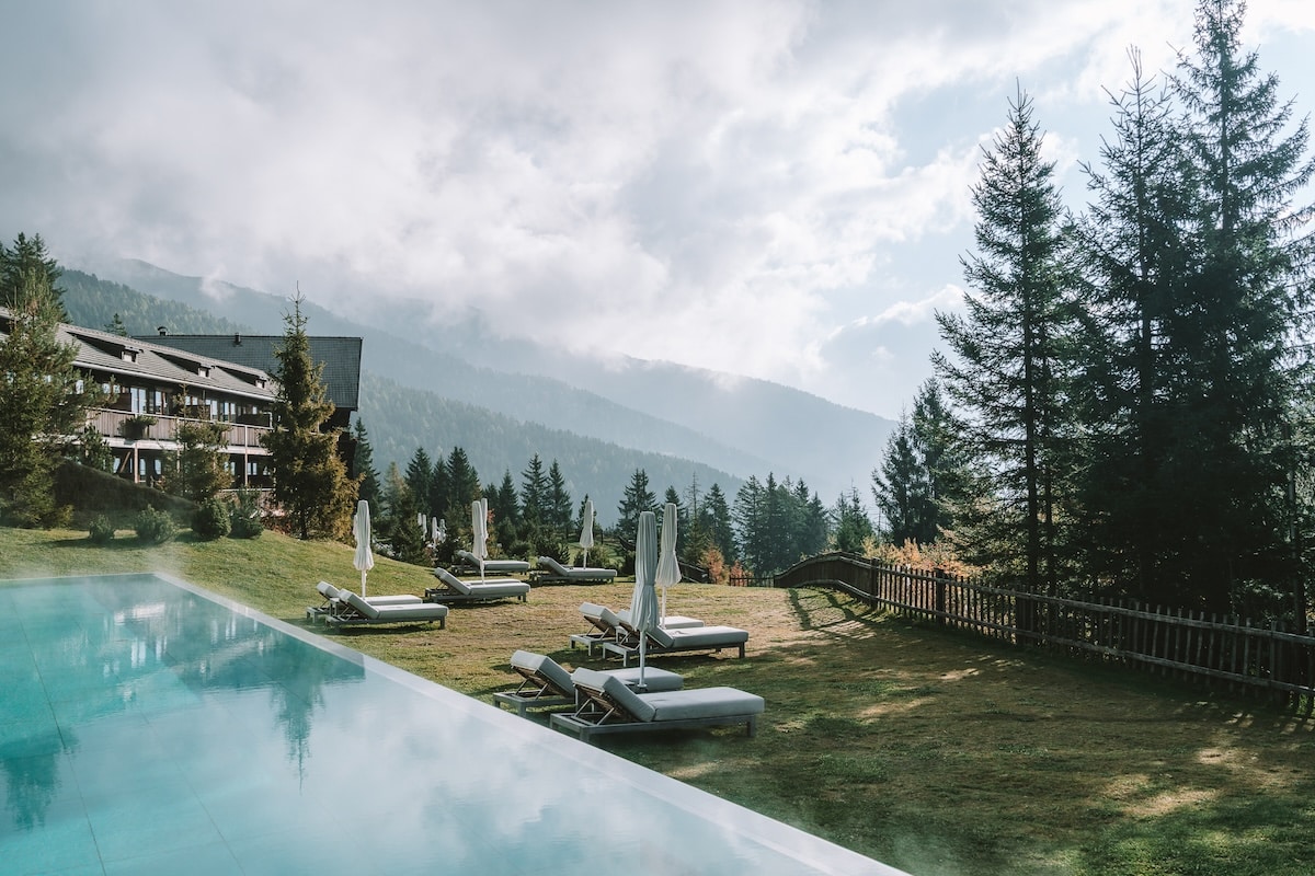 Forestis Dolomites hotel pool Misty day at Forestis Dolomites hotel pool