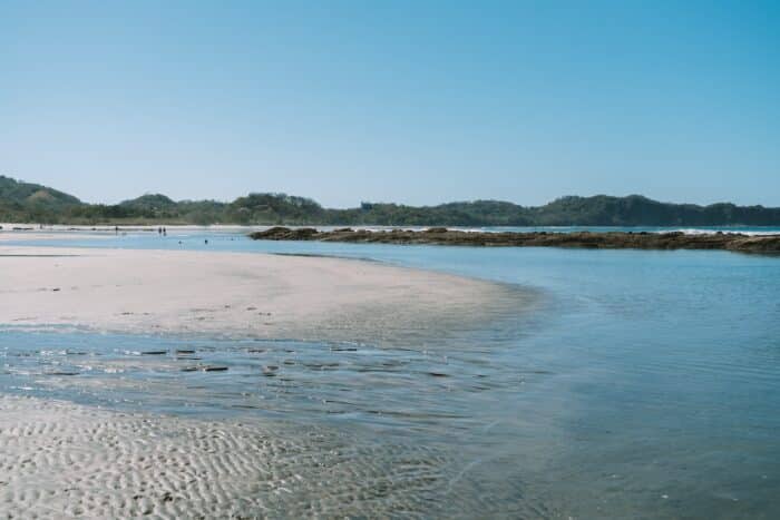 low tide on Playa Guiones Tide pools forming at low tide on Playa Guiones