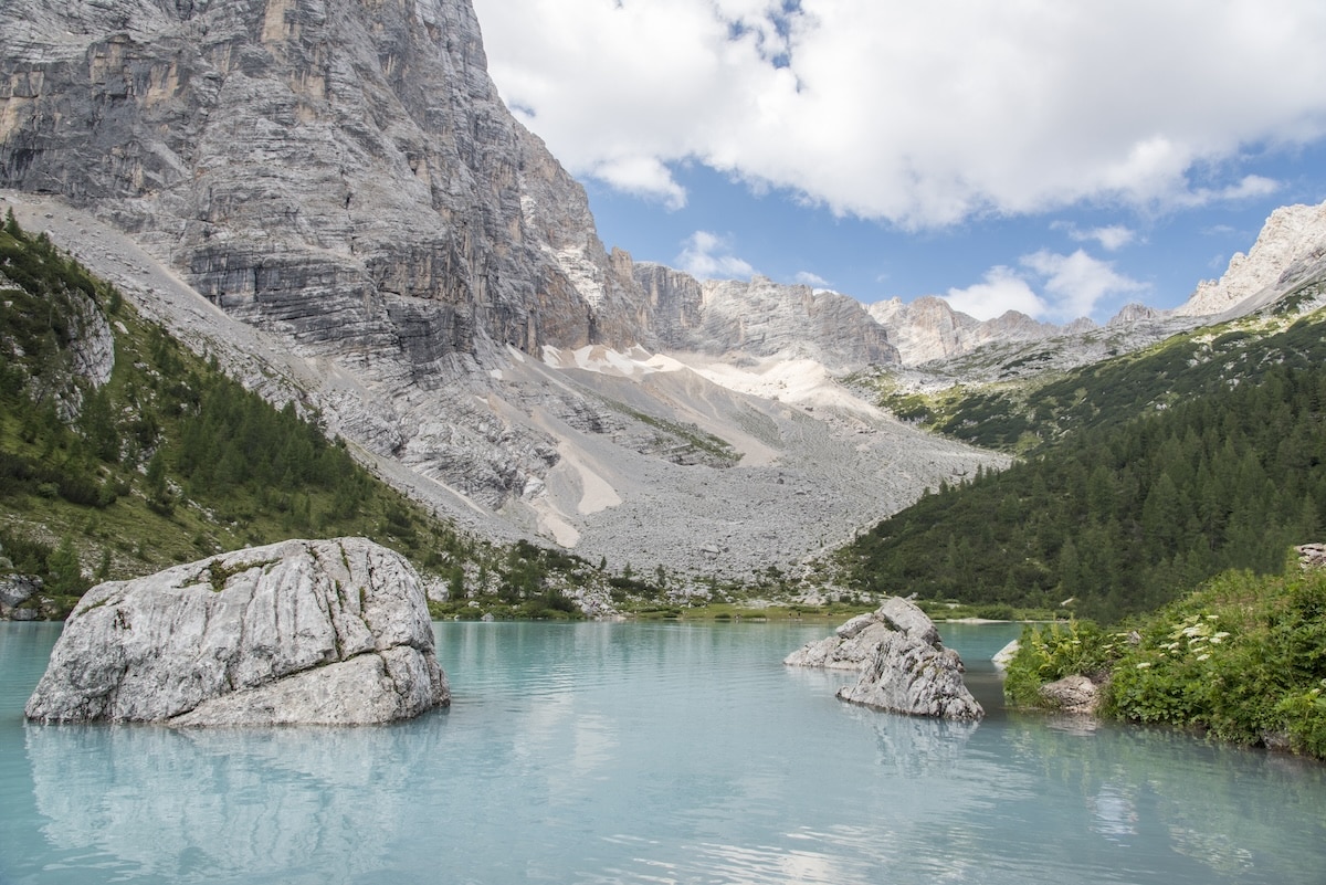 jagged peaks at Lago di Sorapis Milky blue waters backed by jagged peaks at Lago di Sorapis