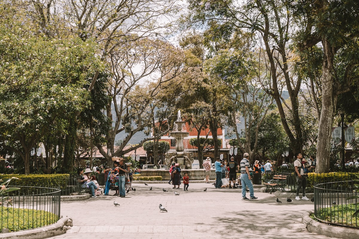 Parque Central People and vendors bustling around the Parque Central featuring a fountain in the center