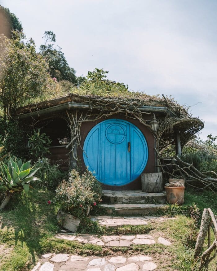 Small hobbit house Small hobbit house with blue door at Hobbitenango