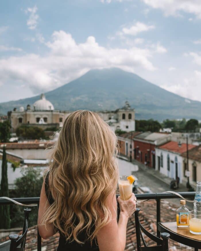 Cafe Sky in Antigua Michelle Halpern enjoying a cocktail at Cafe Sky in Antigua with volcano views in the distance