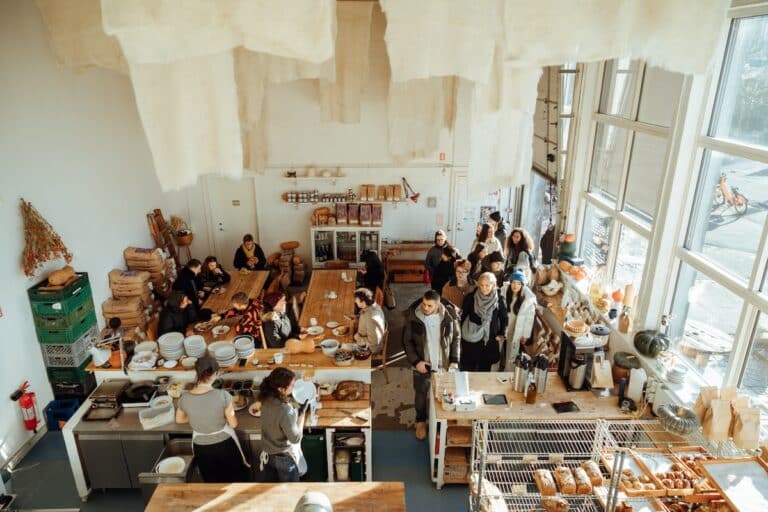 Overhead view of ordering area inside Lille Bakery with light streaming through the window