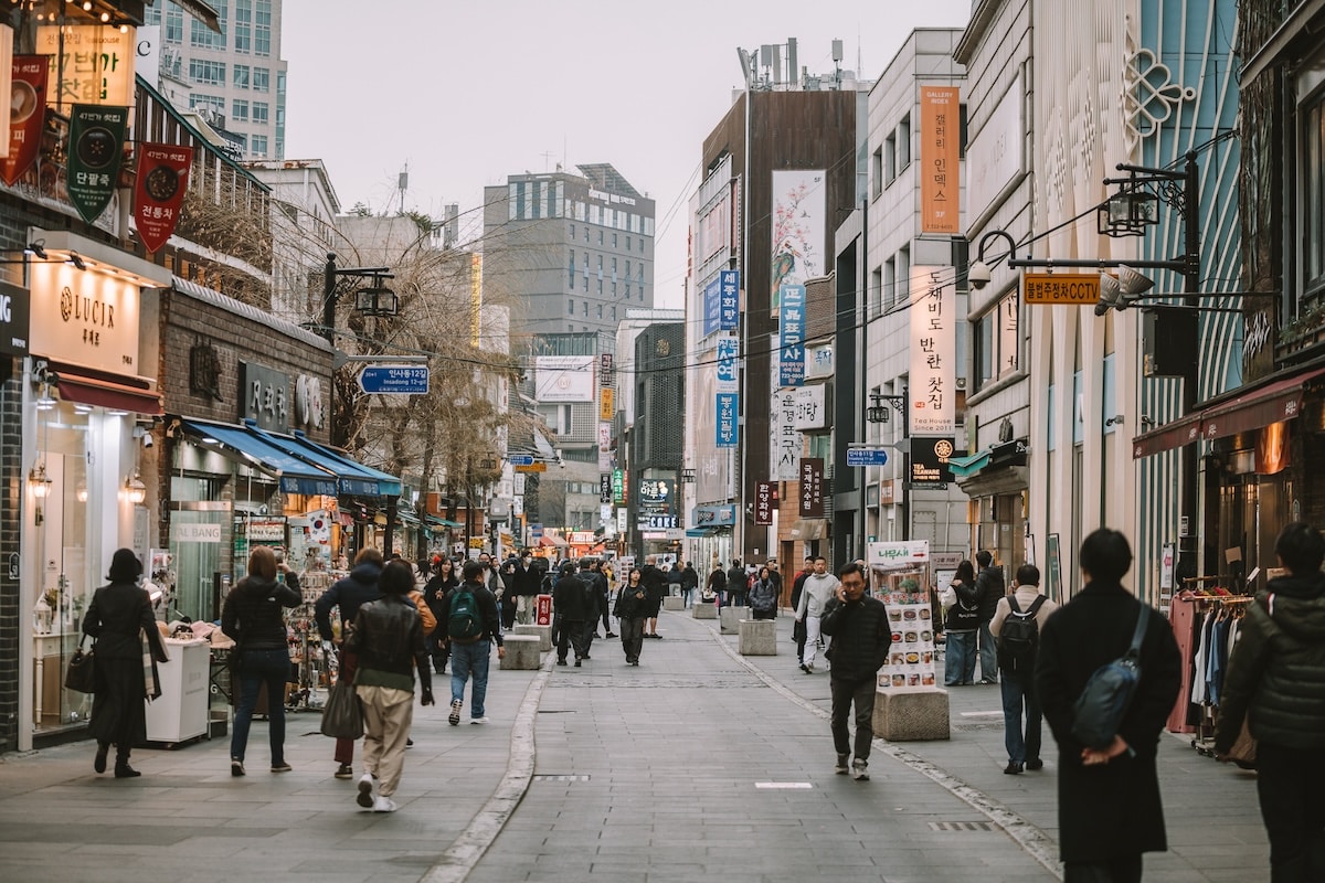 busy street in Seoul Locals and tourists walking a busy street in Seoul, Korea