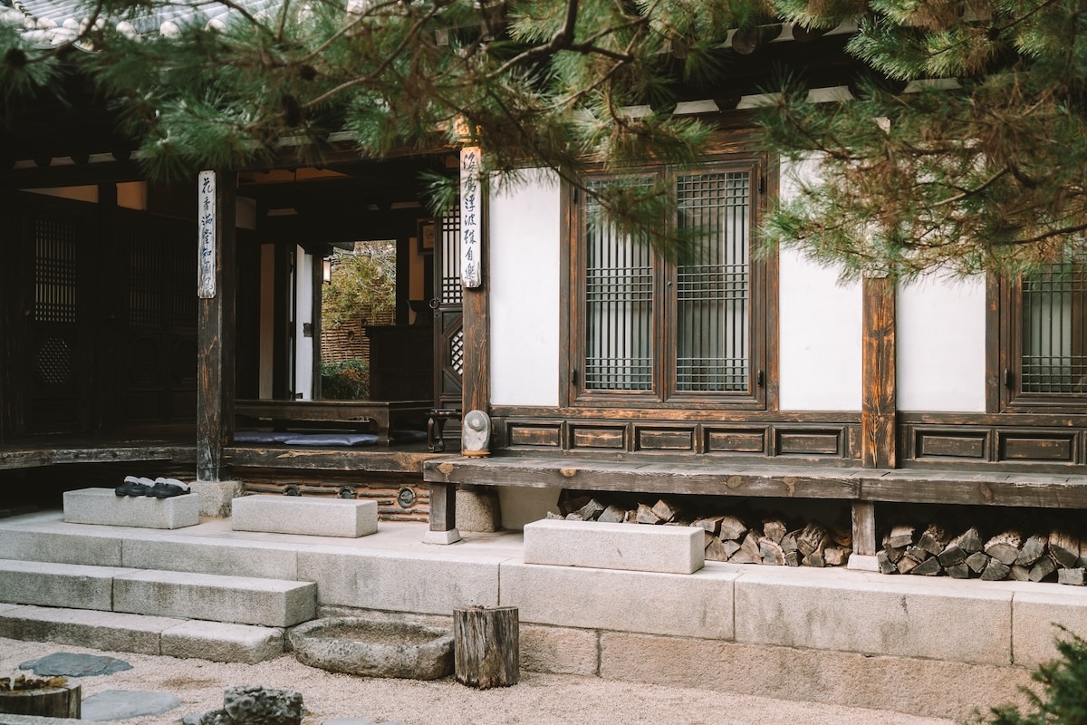 Interior courtyard at Rakkojae Seoul Interior courtyard at Rakkojae Seoul featuring wood and stone and traditional architecture