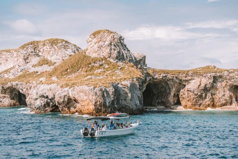 Boat tour leading people towards shore in the Marietas Islands