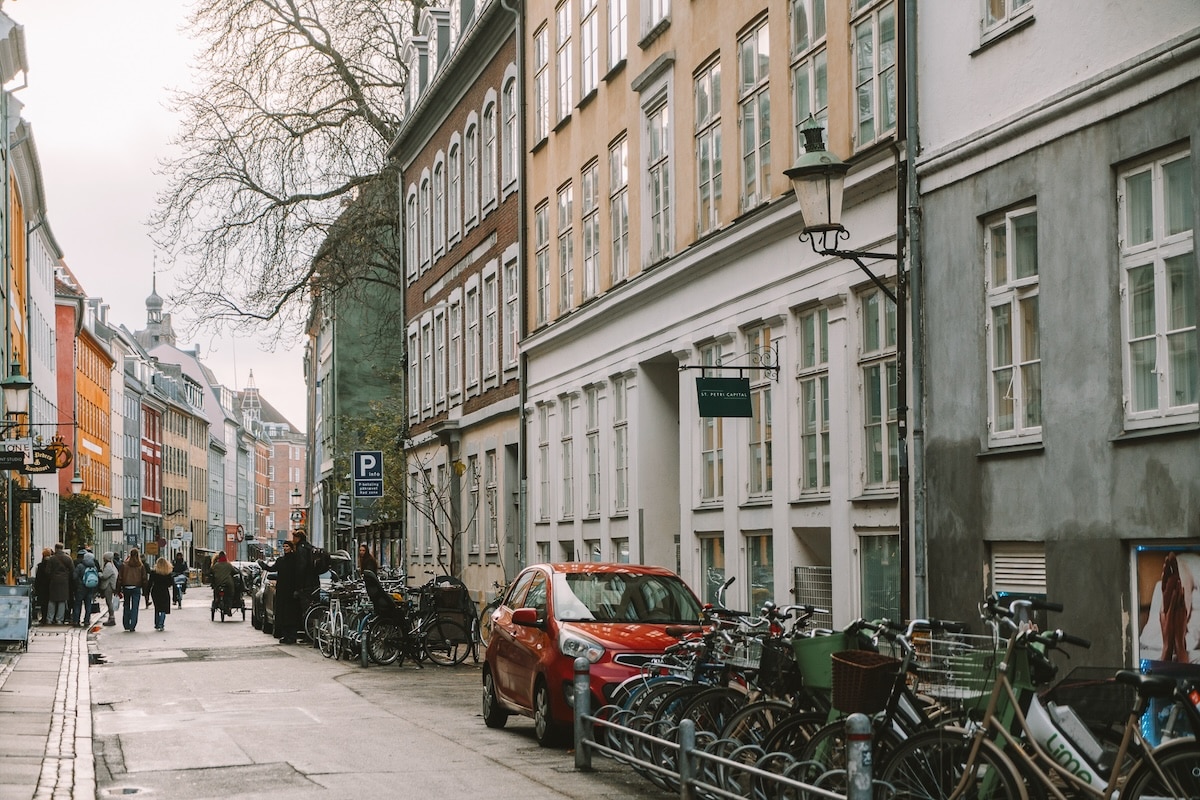 Street in Copenhagen Street in Copenhagen, Denmark lined with colorful Danish buildings in different paint colors