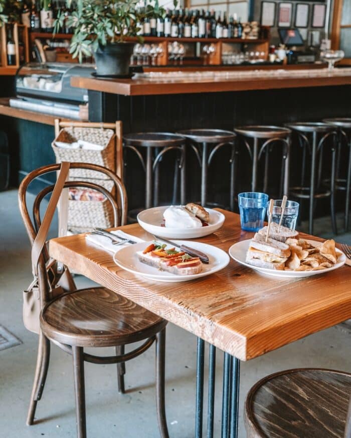 Helena Avenue Bakery Brunch table set up at Helena Avenue Bakery with beach toast, strawberry shortcake and a sandwich