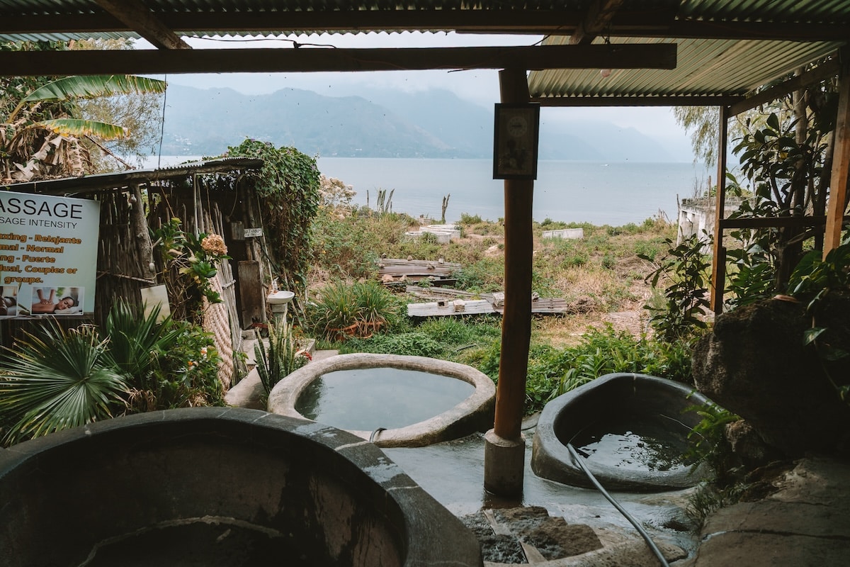 Los Thermales soaking hot tubs Los Thermales soaking hot tubs and cold plunges with views out to Lake Atitlan