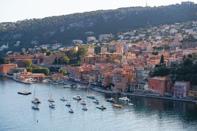 Bird's eye view of the warm toned coastline of Villefrance-sur-Mer in the French Riviera