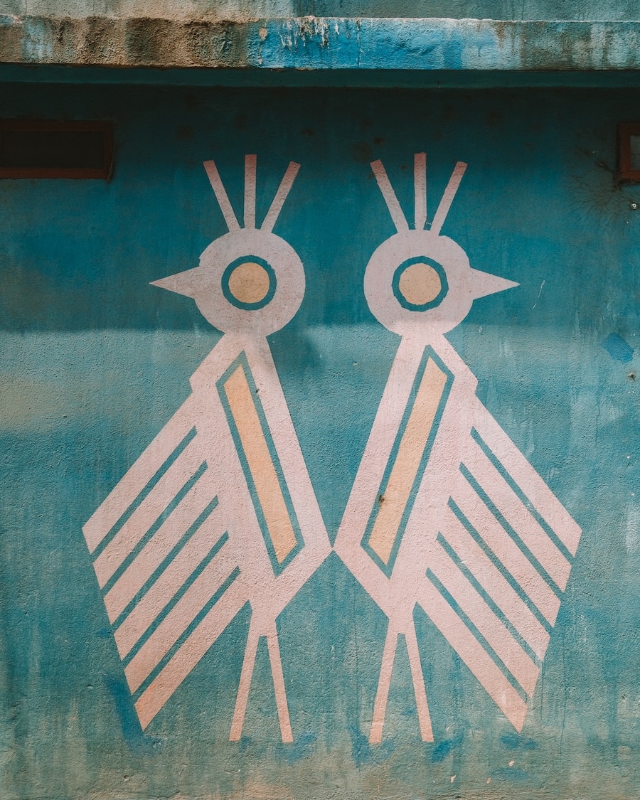 Maya bird symbols Maya bird symbols painted on a blue wall in Santa Catarina Palopo
