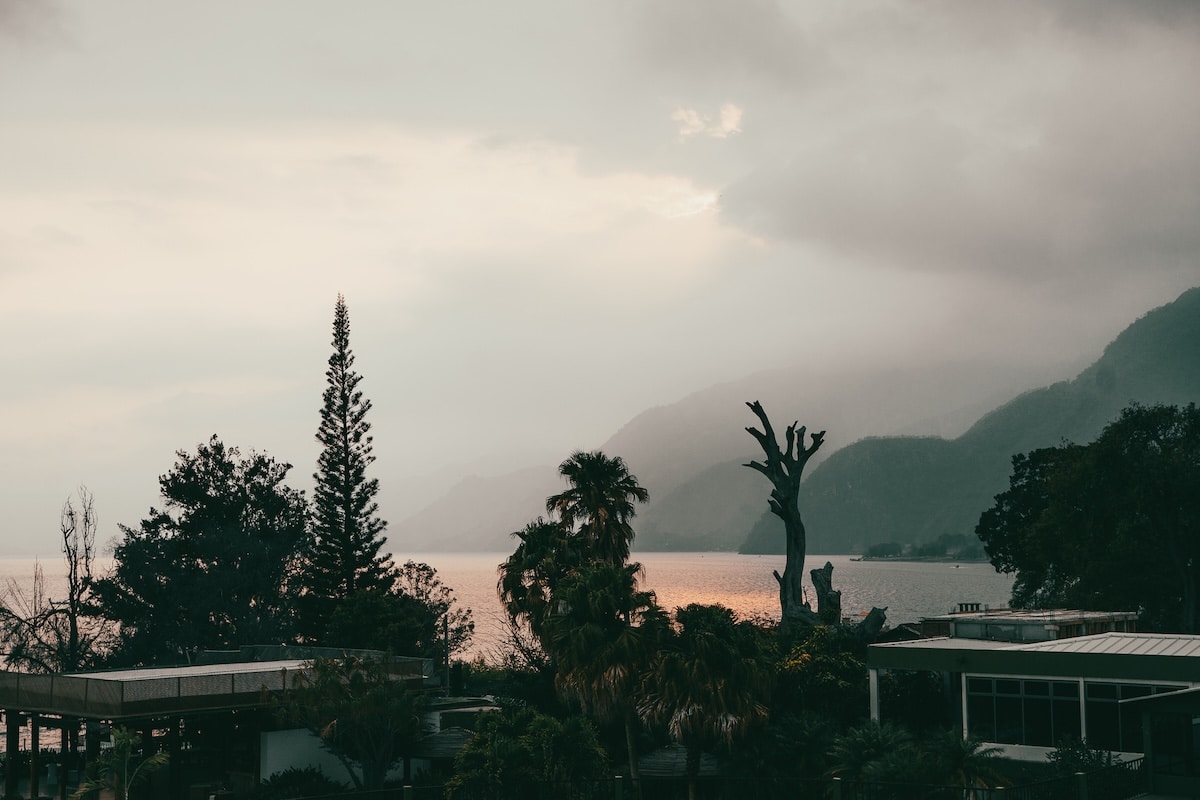 Hazey view of volcanoes Hazey view of volcanoes along Lake Atitlan