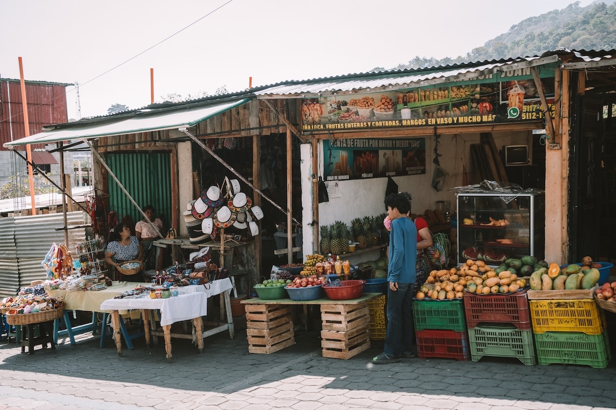 local produce Side street market full of local produce stacked on crates