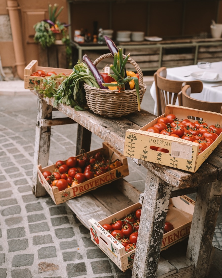Produce display Produce display along a cobblestone street