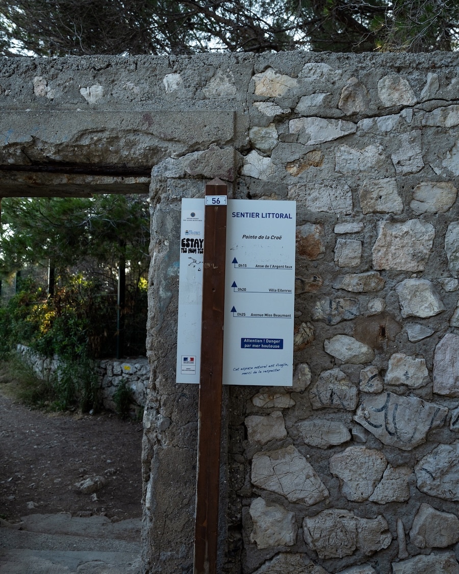 Sentier du Littoral Signage posted along the Sentier du Littoral directing people which way to go